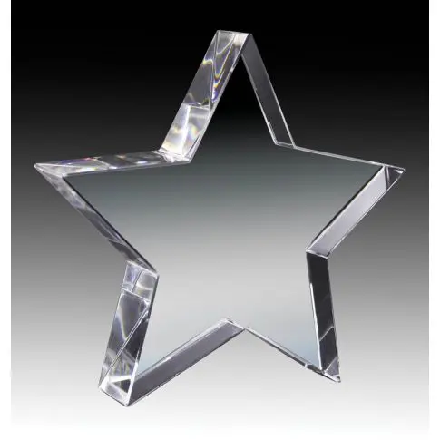 A clear glass star-shaped award or trophy with a black background.
