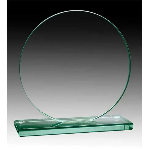 Transparent round glass award on a rectangular base.