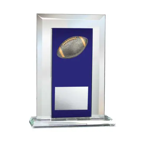 Glass trophy with a football and blank plaque on a blue background.