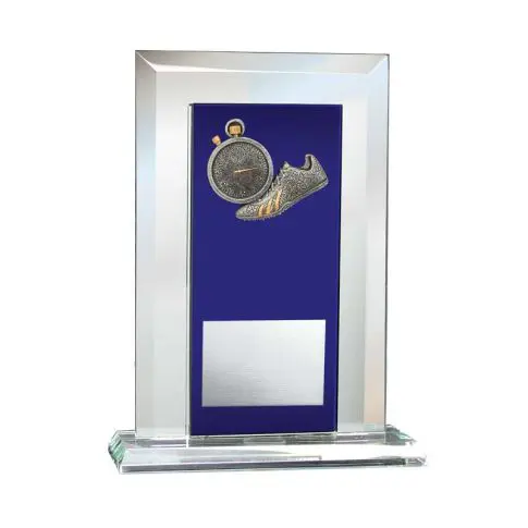 A glass trophy with a silver plate and medallion on a blue background.