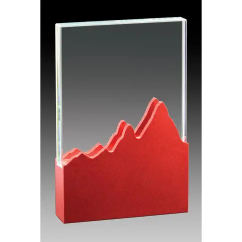 Red and clear glass trophy with mountain-like design.