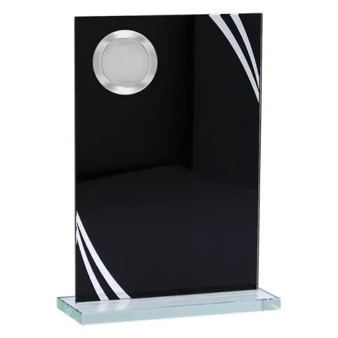 Black glass award with white accents and a round silver emblem.