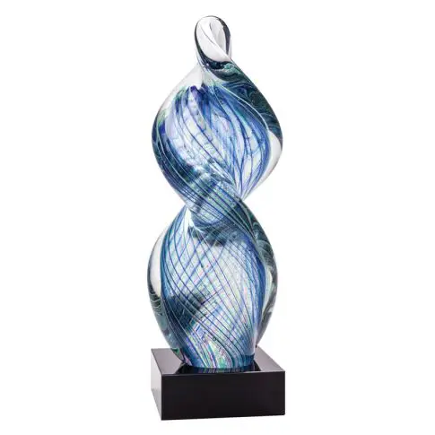 Elegant blue and white glass sculpture with swirling patterns on a black base.