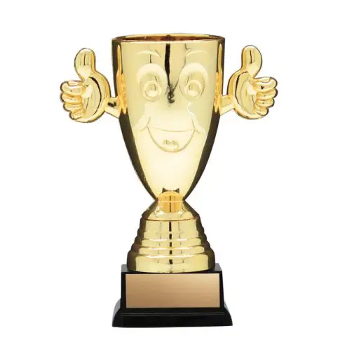 Gold trophy with a smiling face and thumbs-up arms.