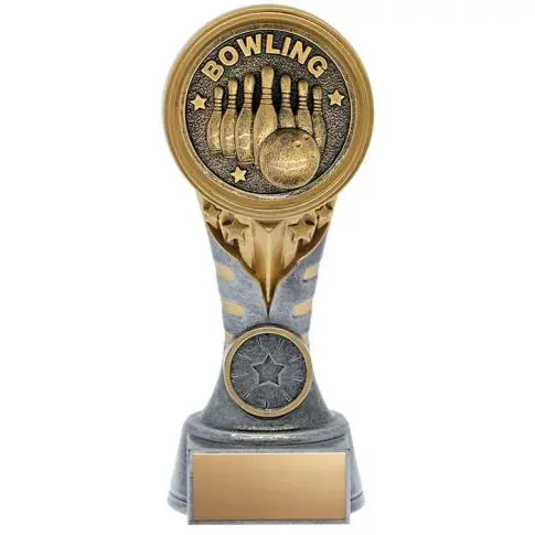 A bowling trophy with a gold emblem and a marble base.