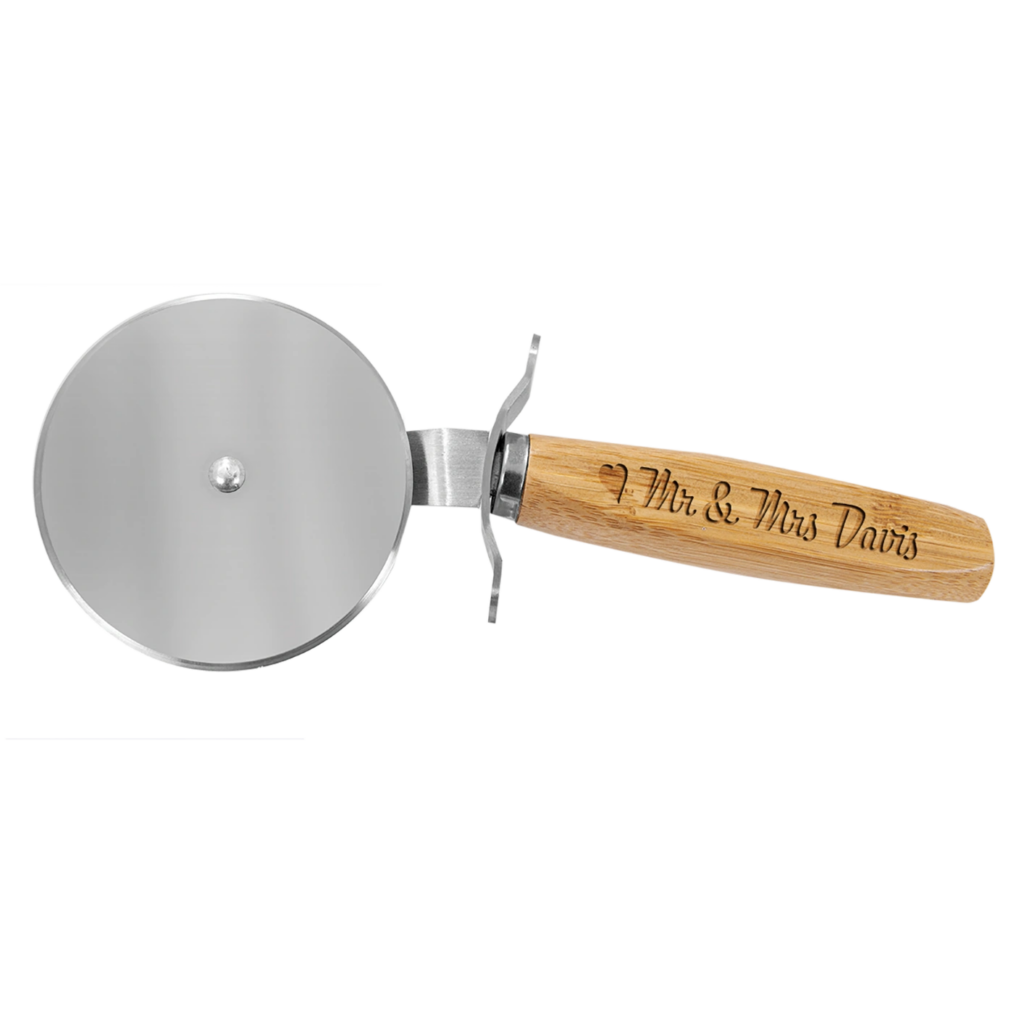 Pizza cutter with wooden handle engraved '7th & 8th Times'.