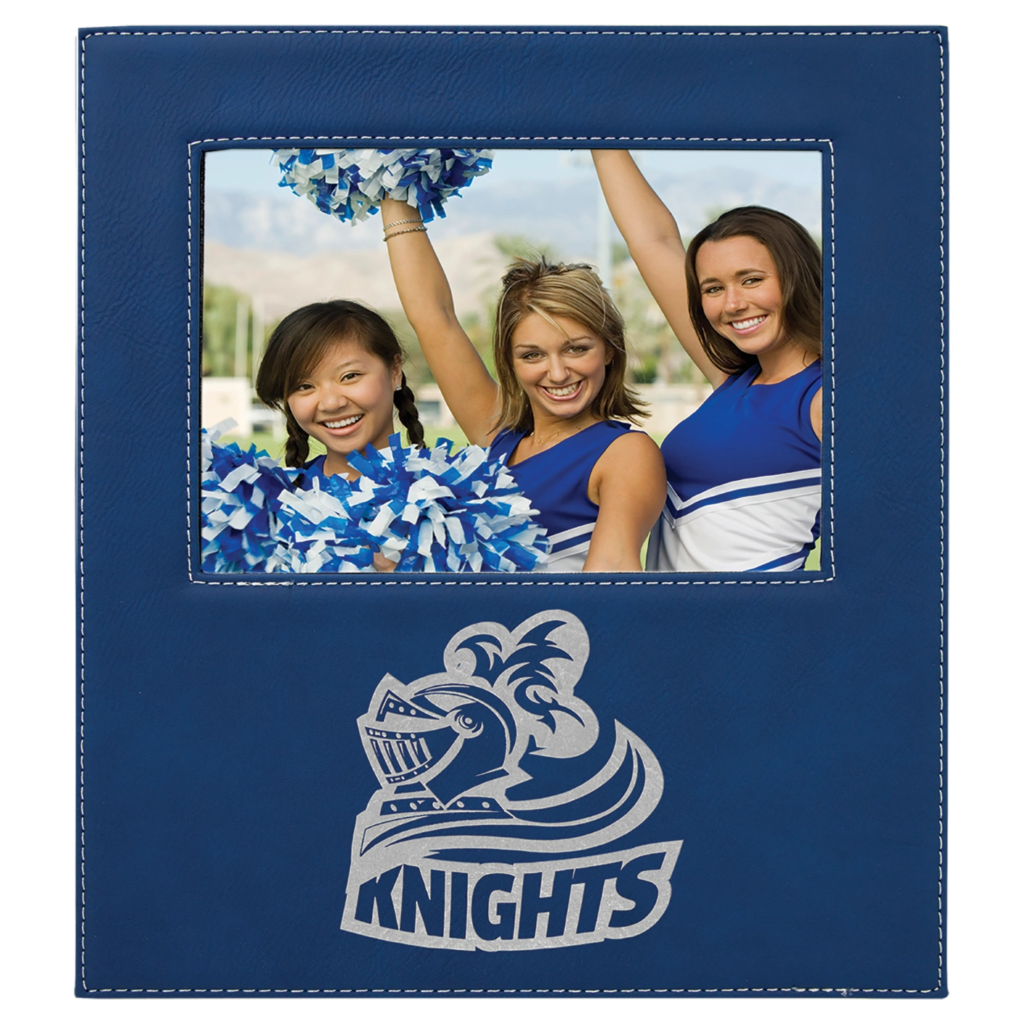 Three cheerleaders posing happily with pom-poms inside a Knights-themed frame.