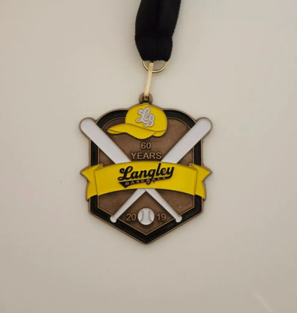 Baseball-themed medal with crossed bats and a yellow banner.