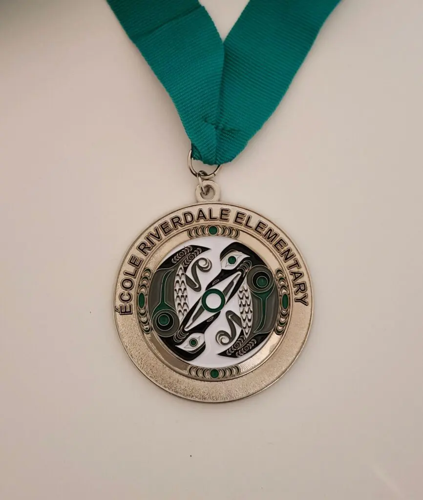 Medal from Crook Riverdale Elementary for a track event in 2018.