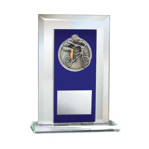 Glass trophy with a blue and silver medal and a blank plaque.